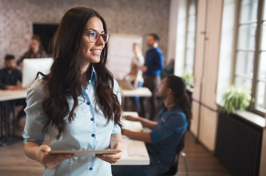 Woman in an office managing people